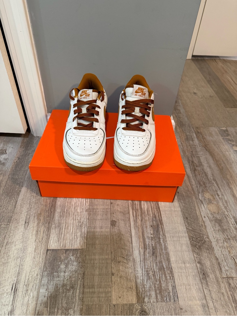 Nike Kids White and Brown Low-Top Sneakers with Gold Accents